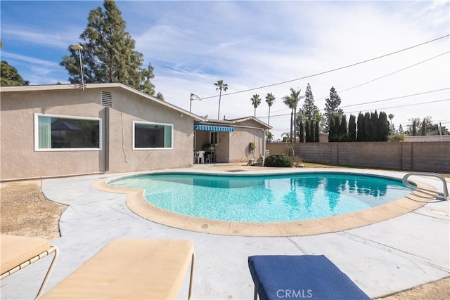 view of pool with a patio