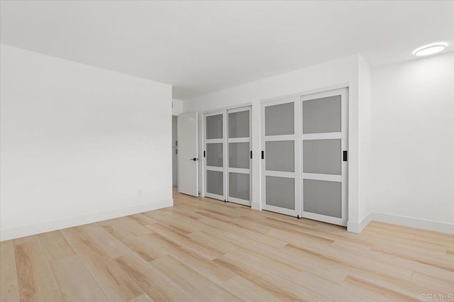 unfurnished room featuring light hardwood / wood-style flooring