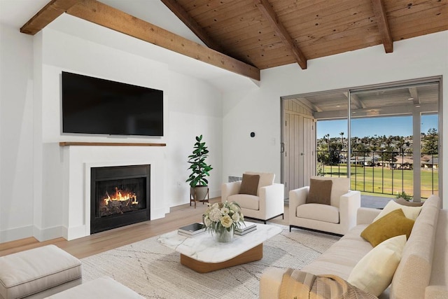 living room with wood ceiling, lofted ceiling with beams, and light hardwood / wood-style flooring