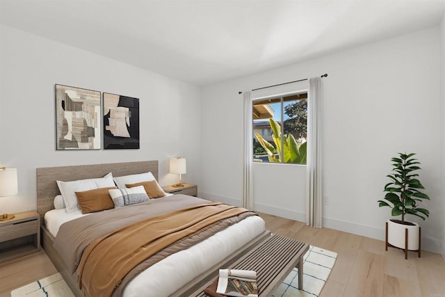 bedroom with light hardwood / wood-style flooring