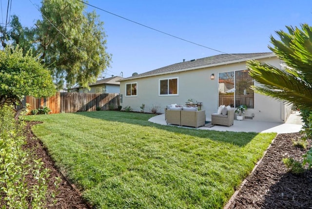 back of house featuring a patio, outdoor lounge area, and a yard