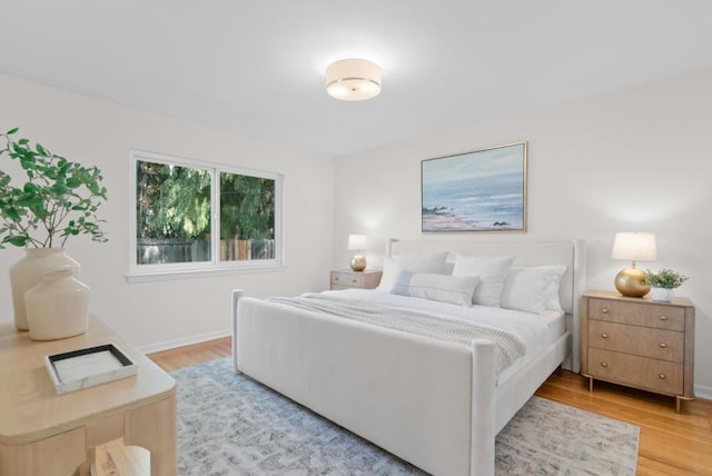 bedroom featuring light wood-type flooring