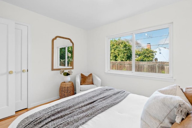 bedroom with hardwood / wood-style floors