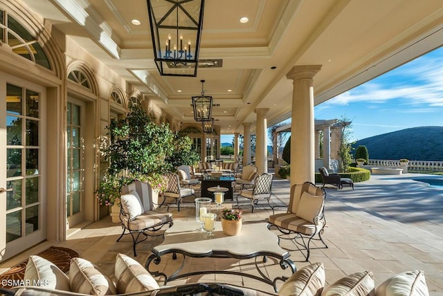 view of patio / terrace with a mountain view