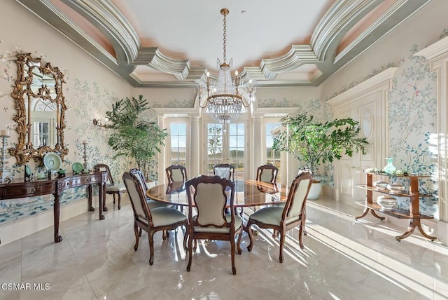 dining space featuring crown molding, decorative columns, and a notable chandelier