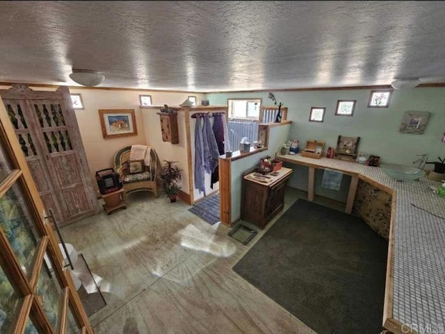 interior space featuring a textured ceiling