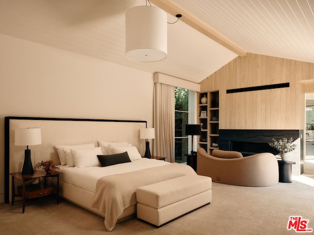 carpeted bedroom featuring lofted ceiling with beams