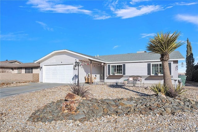 single story home featuring a garage