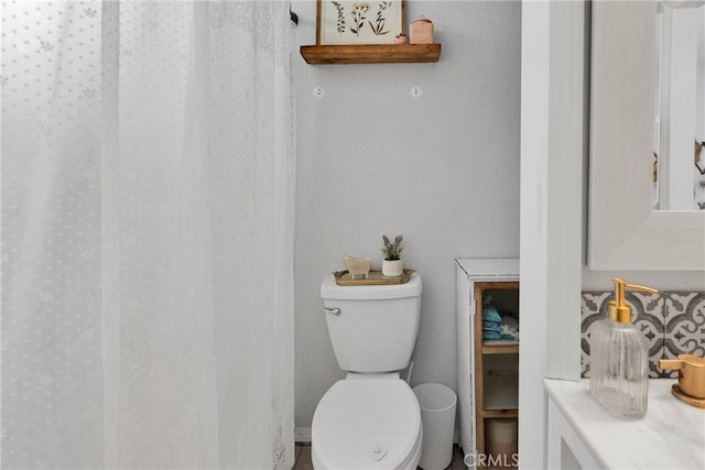 bathroom featuring toilet