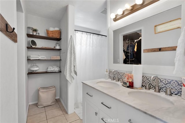 bathroom featuring vanity and tile patterned flooring