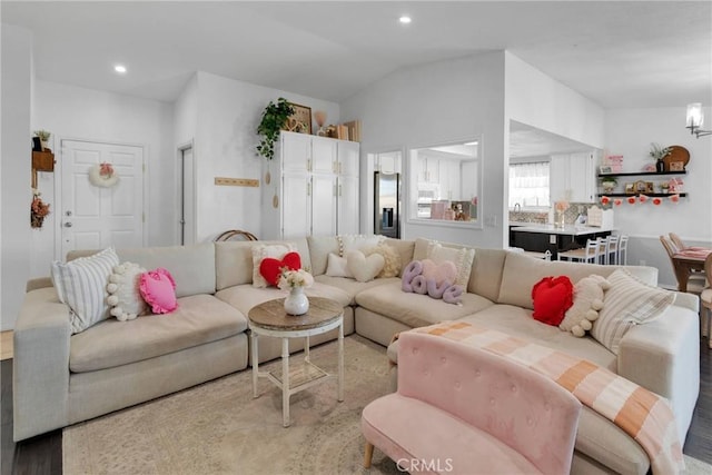 living room with vaulted ceiling