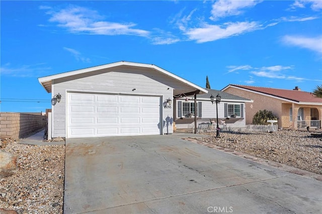 single story home featuring a garage