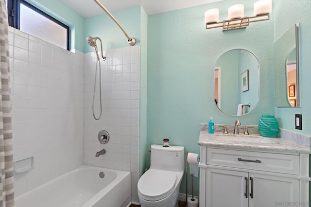 full bathroom featuring vanity, toilet, and shower / bath combo