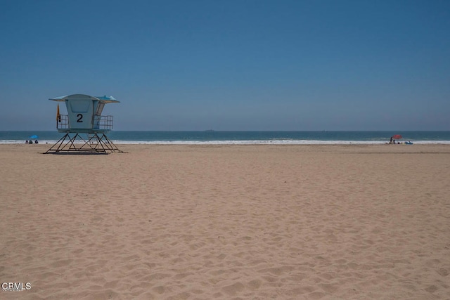 property view of water with a beach view