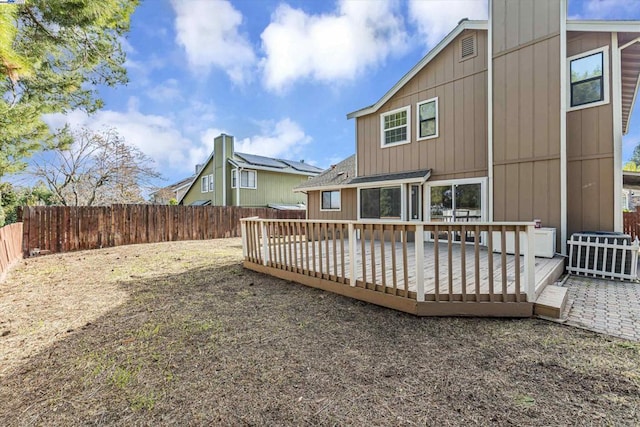 rear view of house with a deck