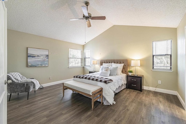 bedroom featuring vaulted ceiling, ceiling fan, a textured ceiling, and dark hardwood / wood-style flooring