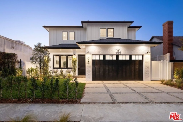 view of front of property featuring a garage