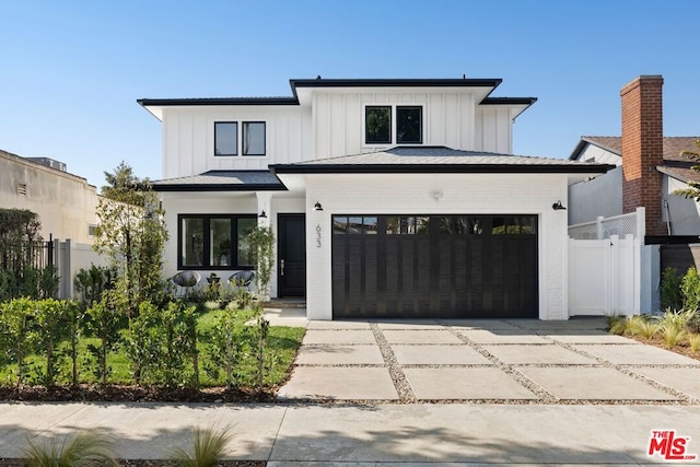 modern farmhouse style home with a garage