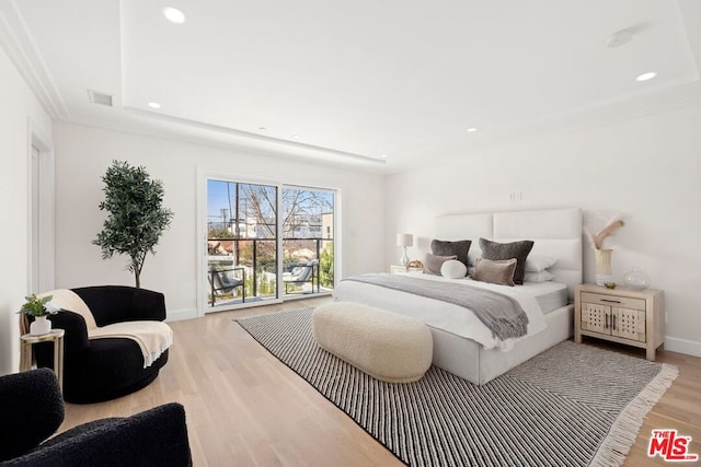 bedroom with light wood-type flooring