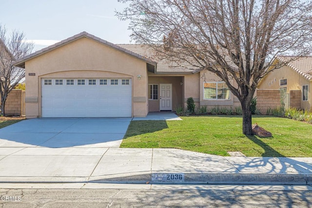 ranch-style home featuring a garage and a front yard