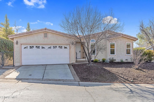 ranch-style home with a garage