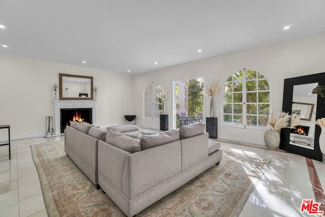 living room featuring light tile patterned floors