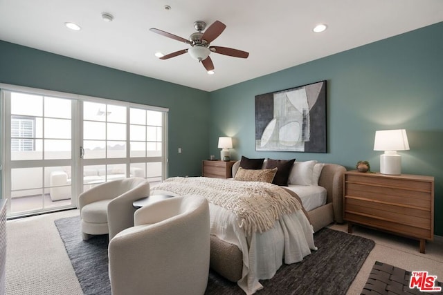 carpeted bedroom with ceiling fan