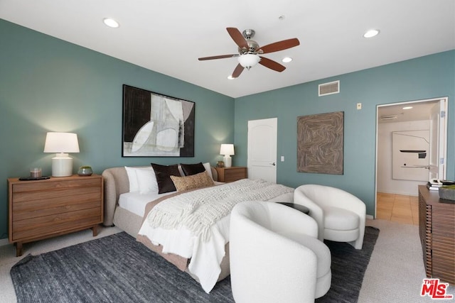 carpeted bedroom with ceiling fan