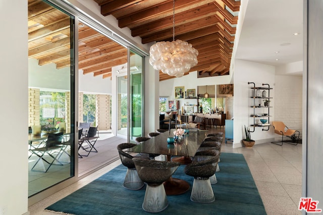 dining room featuring beamed ceiling, wood ceiling, and a chandelier