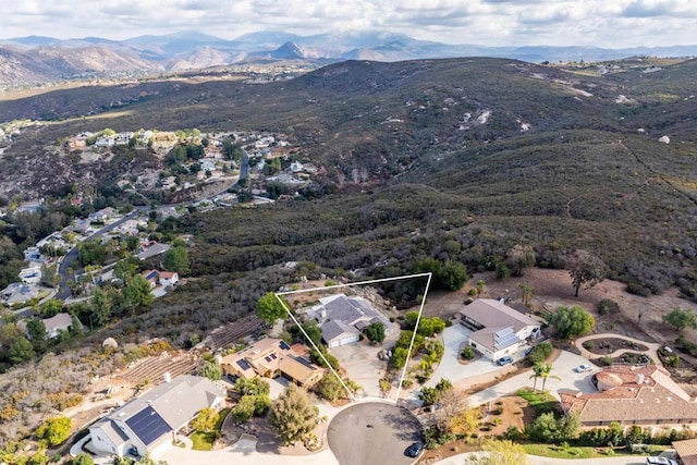 bird's eye view with a mountain view