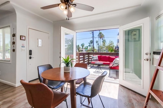 dining room featuring ceiling fan and light hardwood / wood-style floors