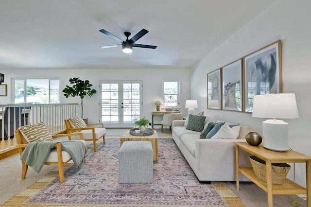 living room with ceiling fan and french doors