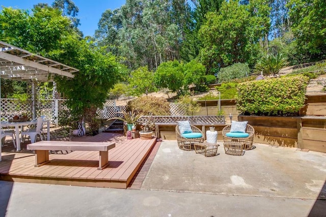 view of patio with a deck and a pergola