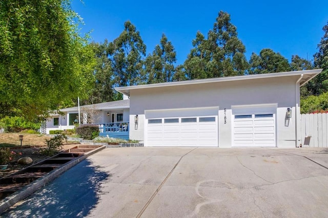 single story home with a garage