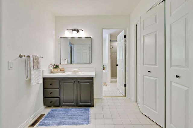 bathroom featuring vanity and tile patterned floors