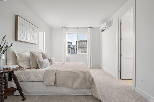 bedroom with light colored carpet and a wall mounted AC