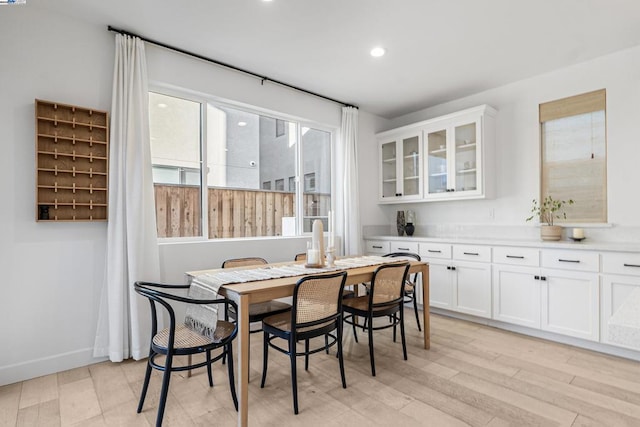 dining room featuring light hardwood / wood-style flooring