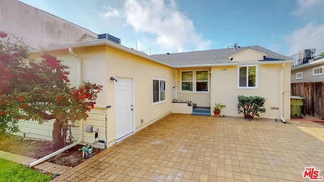 back of house featuring a patio