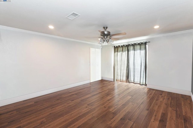 unfurnished room featuring crown molding, dark wood-type flooring, and ceiling fan