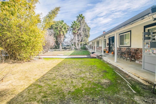 view of yard with a patio