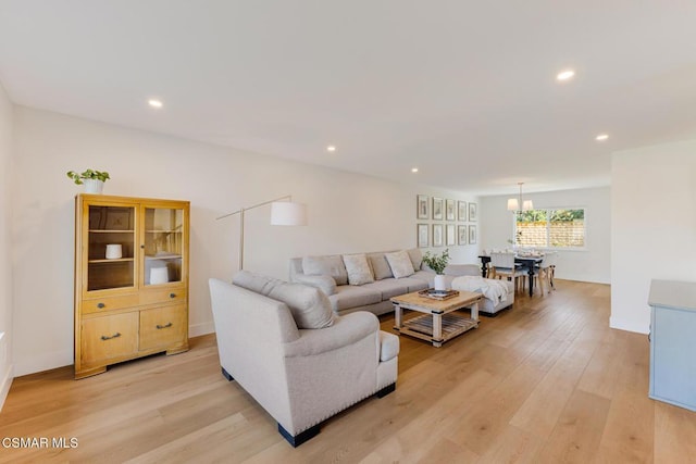 living room with light hardwood / wood-style flooring