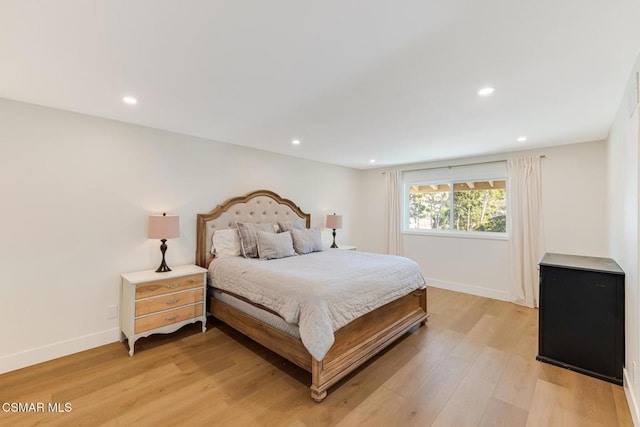 bedroom featuring light hardwood / wood-style flooring