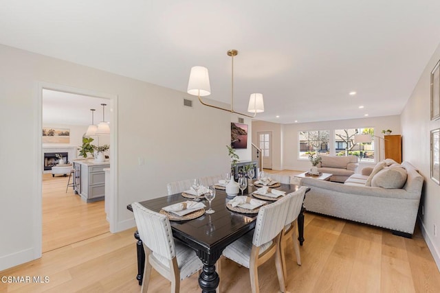 dining room featuring light hardwood / wood-style flooring