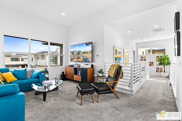 living room featuring light carpet