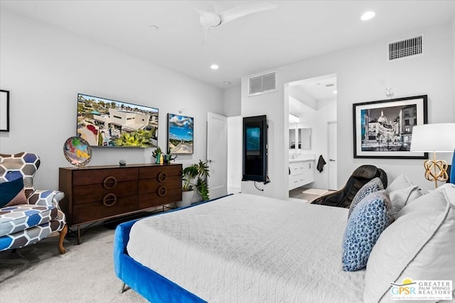 bedroom featuring light colored carpet