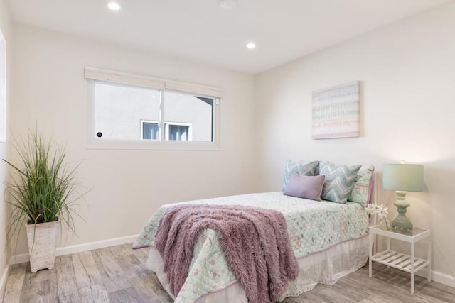 bedroom featuring light hardwood / wood-style flooring