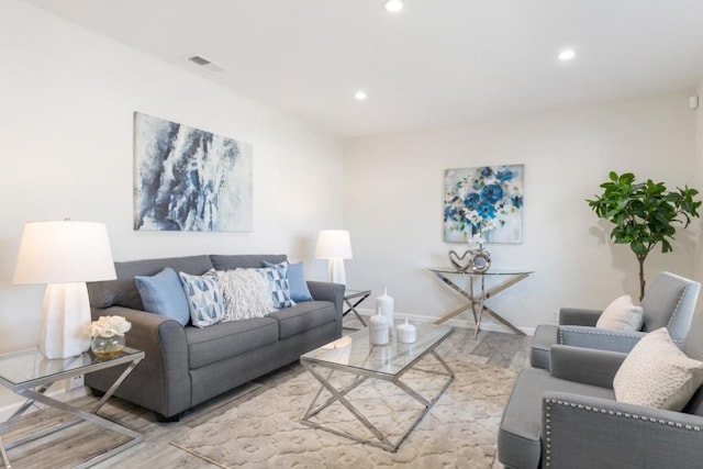 living room with light hardwood / wood-style flooring