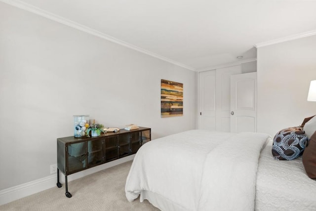 bedroom featuring light carpet, ornamental molding, and a closet