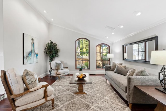 living room featuring hardwood / wood-style flooring and ornamental molding