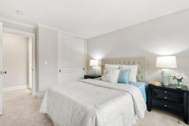 bedroom with light carpet and ornamental molding